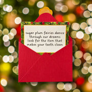 christmas scavenger hunt clue in red envelope that says 'sugar plum fairies dance through our dreams look for the item that makes your teeth clean'