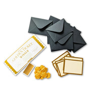 diy scavenger hunt kit with black envelopes, gold wax seals, and a golden ticket scratch off prize